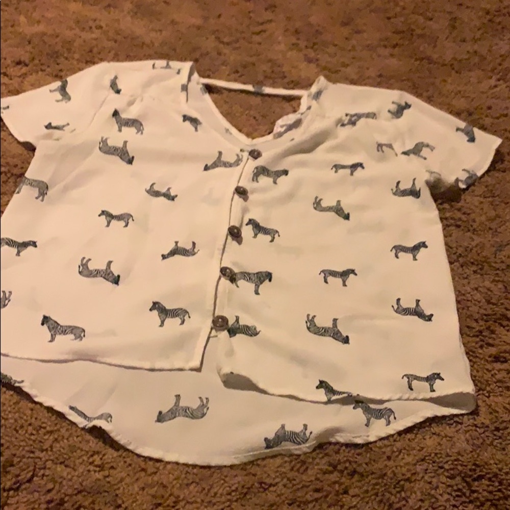 Button up blouse. Kind of like a crop top